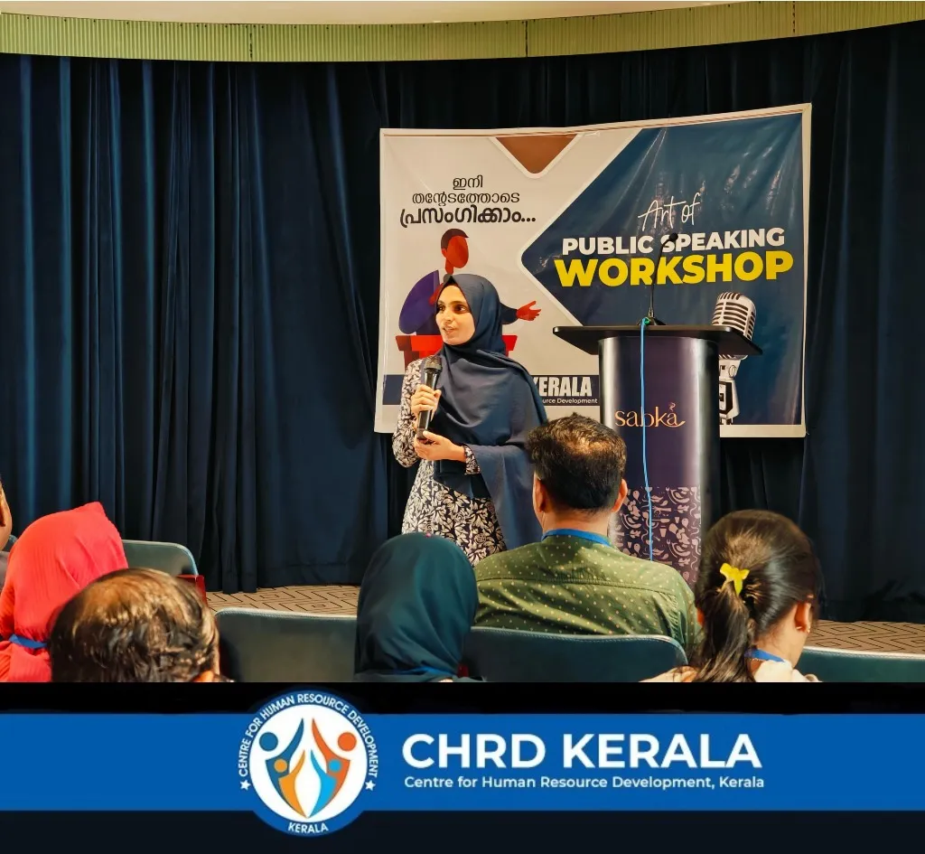 Female instructor presenting at CHRD Training Academy public speaking workshop
